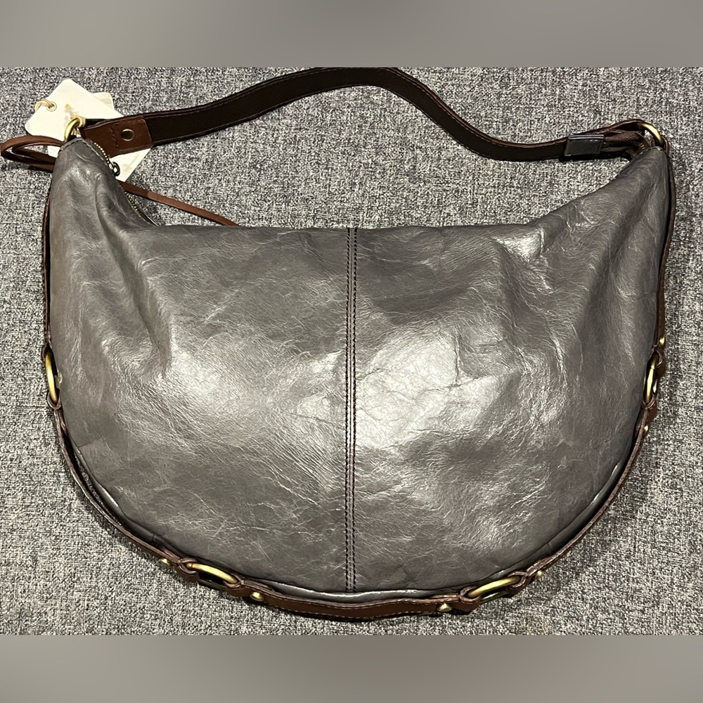 Hobo bag NWT leather graphite with brown and gold detail. Comes with cloth bag.